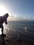 FZ010582 Jenni skipping stones from Exmouth beach.jpg